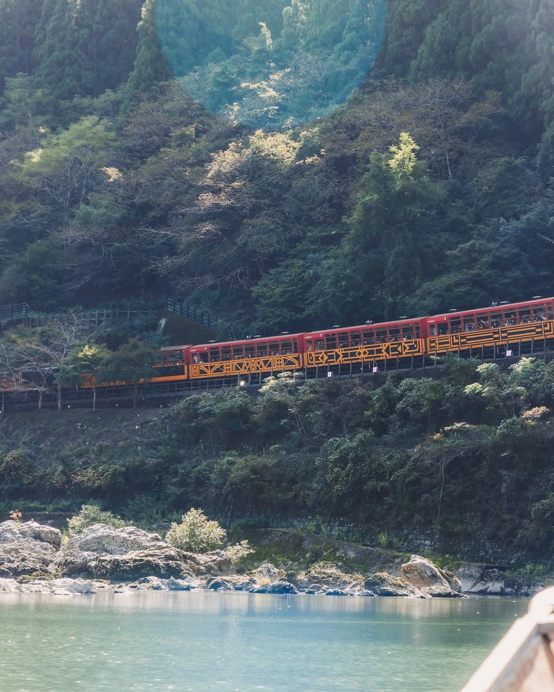 Sagano romantic train runs along the gorge above Hozugawa river